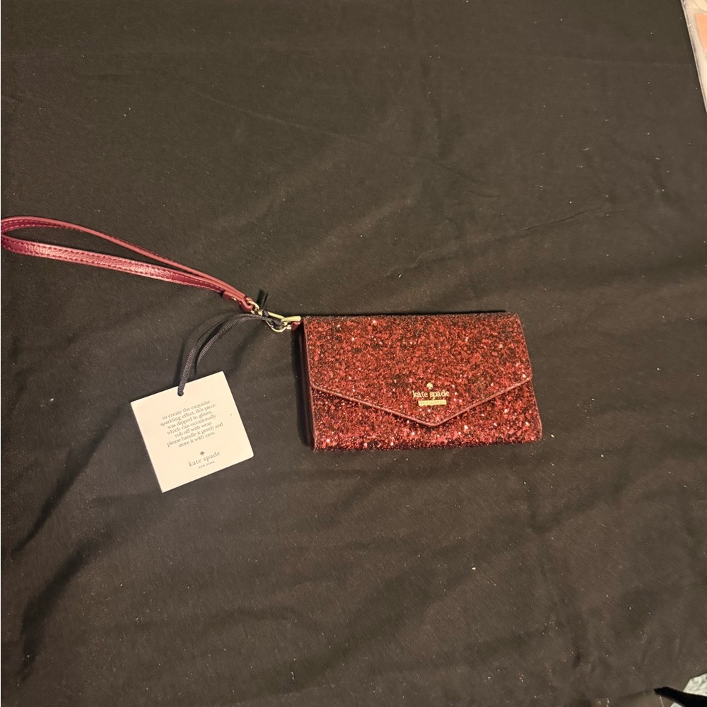 kate spade red wine glitter envelope wristlet with detachable strap